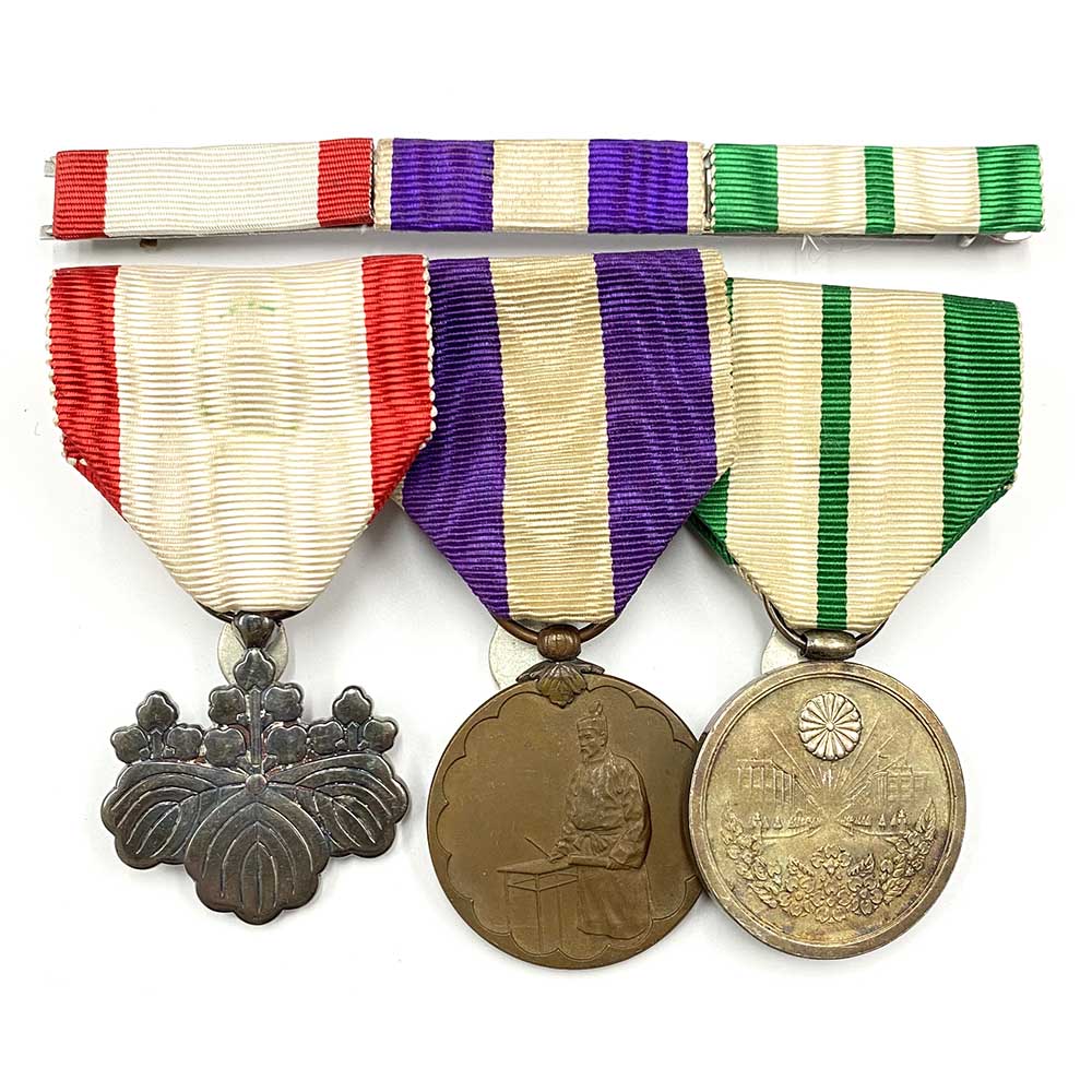 Group of 3 mounted with ribbon bar. 1